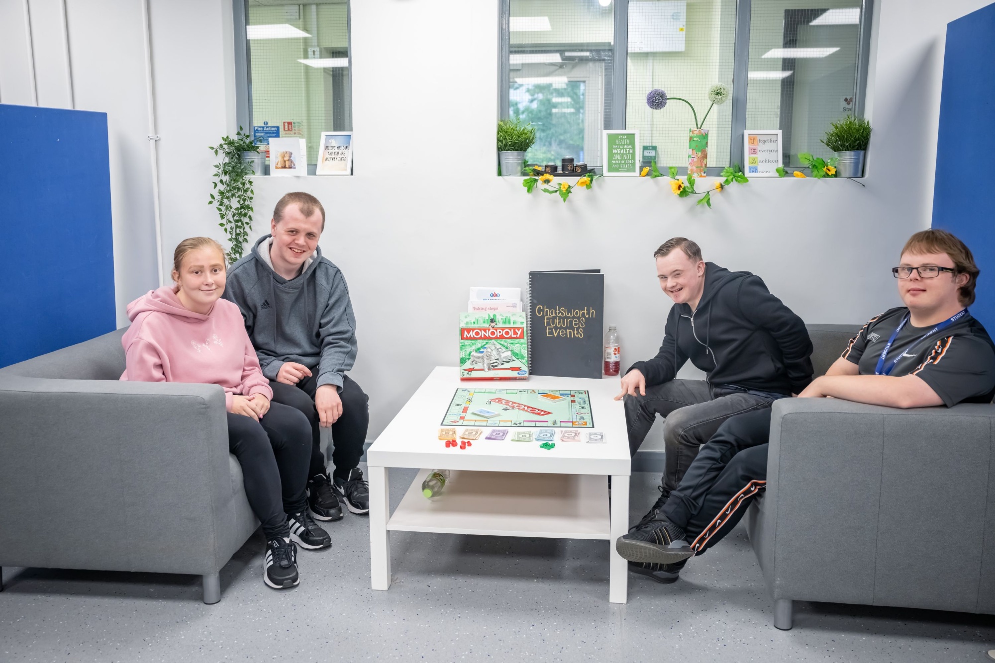 Children playing monopoly together